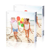 Custom acrylic photo frames displaying a family enjoying a sunny beach day with balloons.