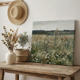 Canvas print of wildflower field on rustic wood table with straw hat and vase decor