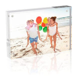 Custom acrylic photo frame displaying a happy family at the beach with colorful balloons