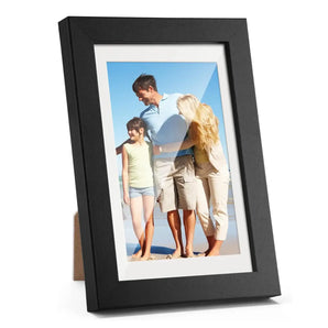 Black photo frame displaying a family beach picture, customizable home decor