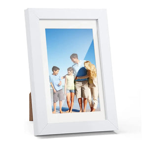White picture frame displaying a family photo, perfect for custom home decor