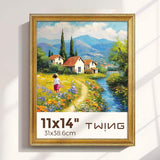 Framed canvas art print of a girl walking on a flower path by cottages and mountains, 11x14 inches