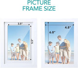 Two white picture frames with measurements 3.5 x 5.5 inches and 4.8 x 6.8 inches, displaying a family photo on the beach.