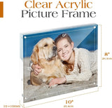 Clear acrylic picture frame displaying a photo of a woman and dog on the beach, frame size 10x8 inches.
