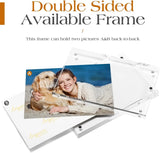 Double sided clear acrylic photo frame holding two pictures back to back on a white background