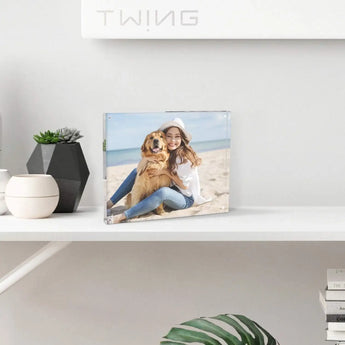 Custom acrylic photo frame on shelf with woman and dog on beach, modern home decor