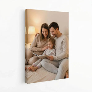Custom canvas print featuring a happy family reading together in a cozy bedroom