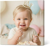 Smiling baby wearing crown eating cake, custom canvas print, birthday party background
