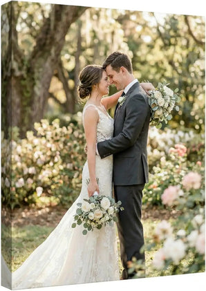Custom canvas print of bride and groom embracing outdoors in garden setting
