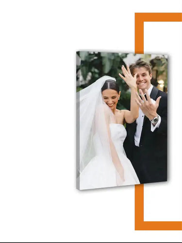 Custom canvas print featuring a happy bride and groom celebrating their wedding day.
