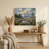 Cozy living room with landscape canvas print, rustic decor, and neutral tones