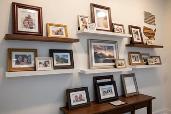 Gallery wall with assorted custom photo frames and family pictures on floating shelves